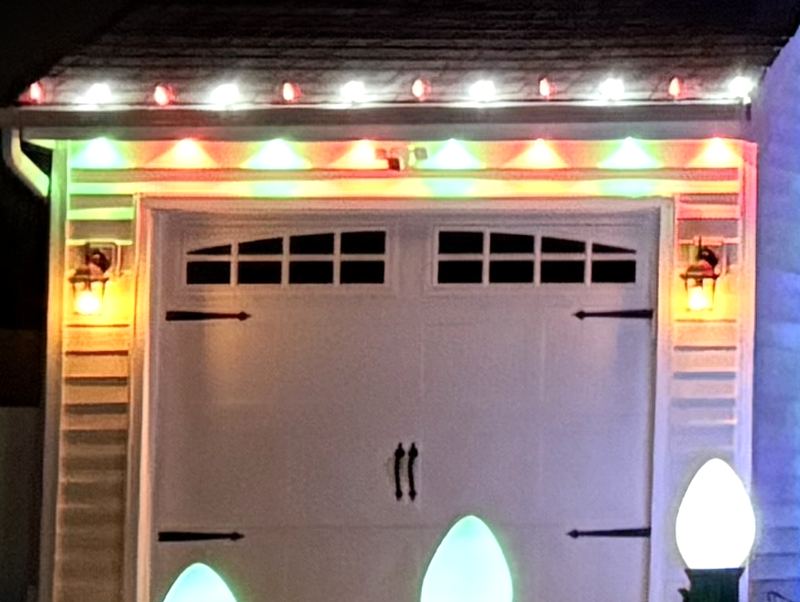 Multicolor lights on a garage roofline